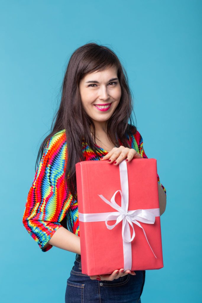 cheerful good looking young brunette woman holding 2025 02 25 11 41 09 utc 1365x2048 1